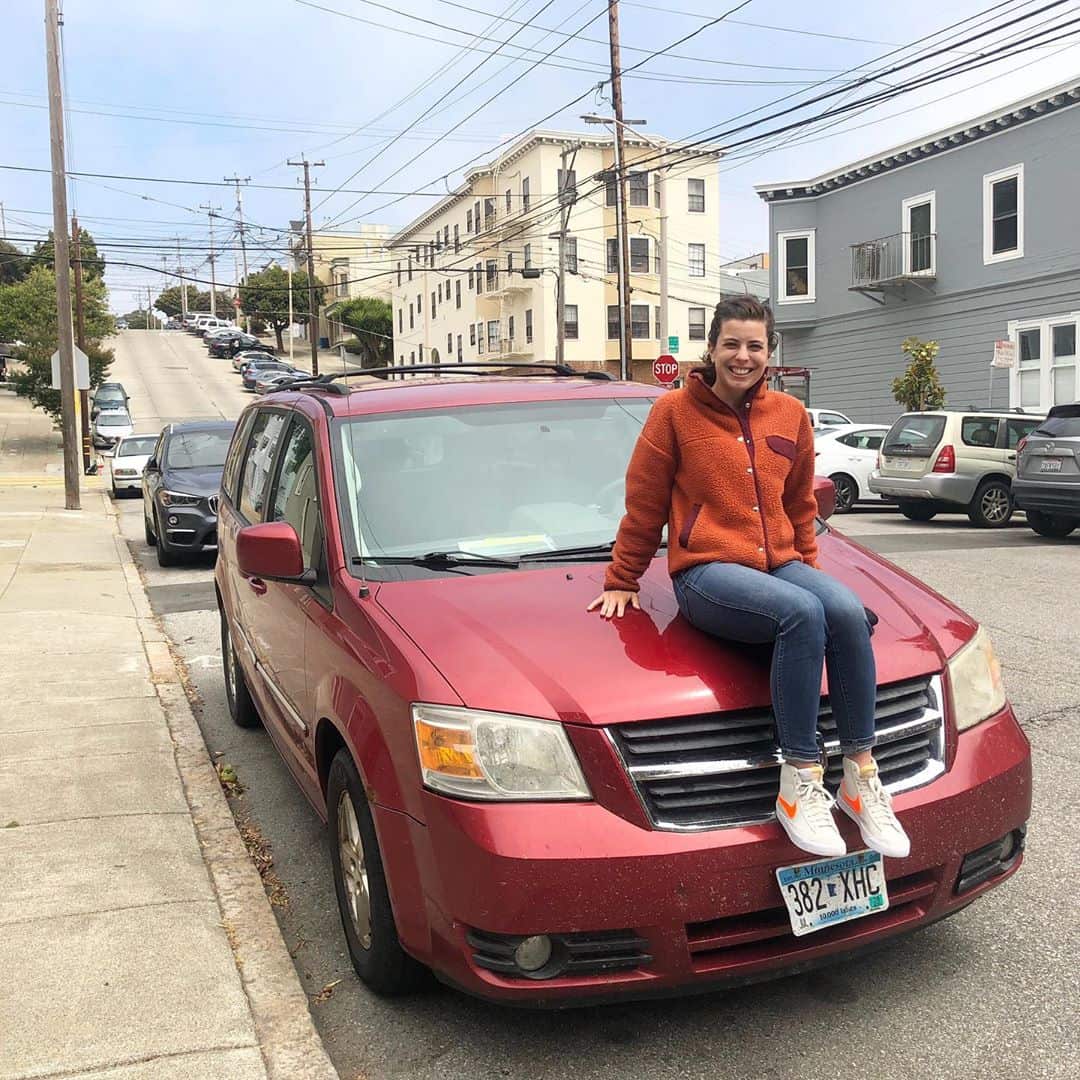 Demi sits on the bonnet of the car that was trade 15